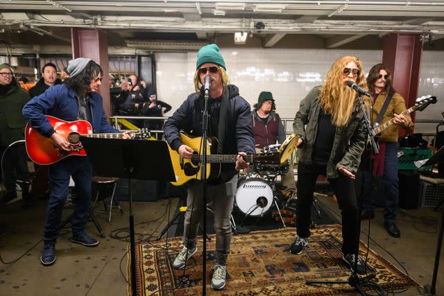 <p>Todd Owyoung/NBC via Getty</p> Green Day and Jimmy Fallon busk in the New York City subway on Jan. 18, 2024