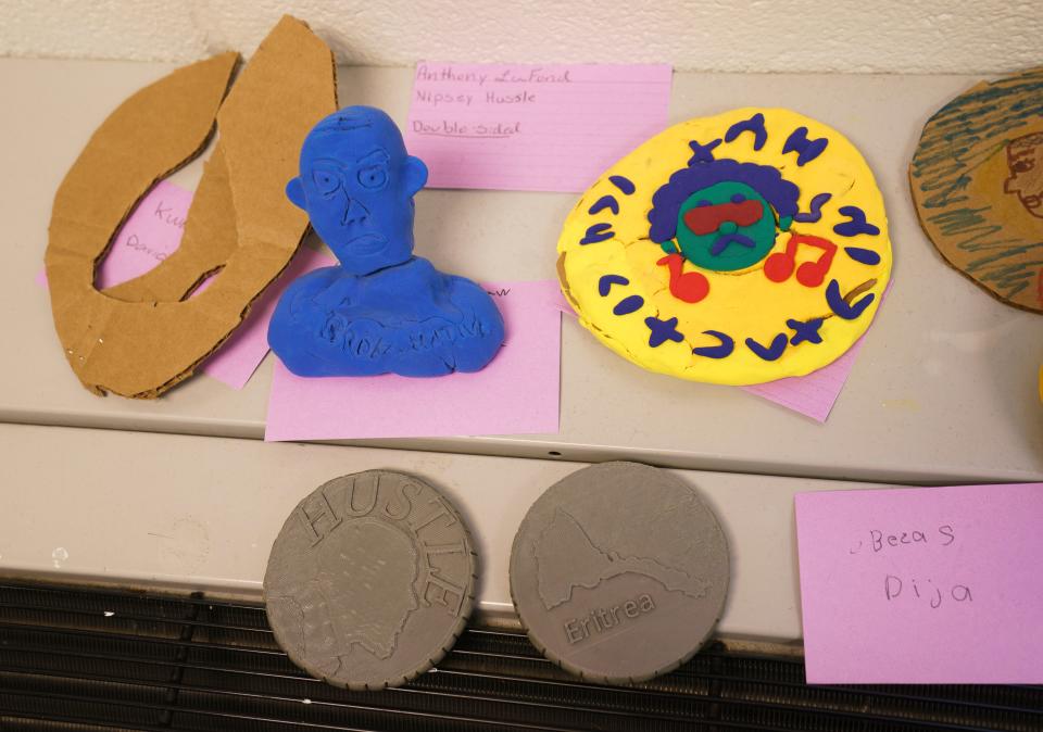 In one of their first projects, students in Sean Miller's AP African American Studies In Lorton, Virginia, class made clay figurines and coins representing ancient African civilizations.