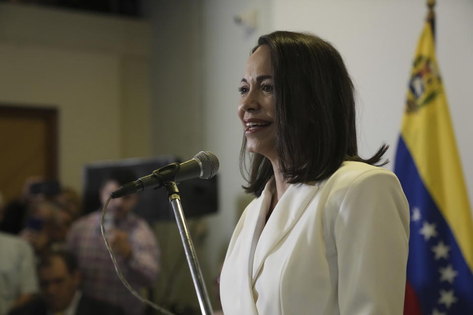 Maria Corina Machado speaks during a ceremony with the Opposition Primary Commission to recognize her electoral win in the opposition-organized primary election to choose a presidential candidate in Caracas, Venezuela, Thursday, Oct. 26, 2023. (AP Photo/Ariana Cubillos)