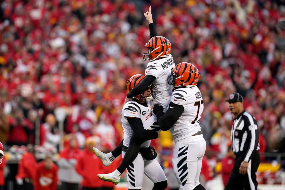 Cincinnati Bengals kicker Evan McPherson (2) celebrates with teammates after kicking a game-winning 31-yard field goal during overtime in the AFC championship NFL football game against the Kansas City Chiefs Sunday.