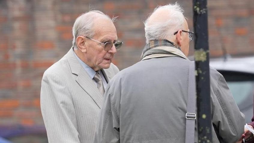 Michael Woods standing with another man outside Norwich Crown Court