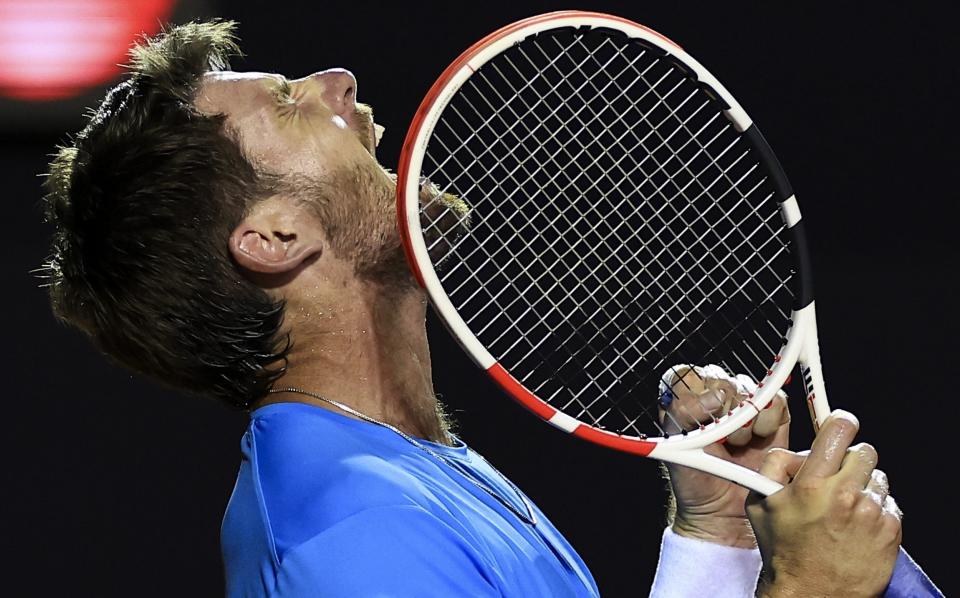 Cameron Norrie celebrates after winning the match against Carlos Alcaraz