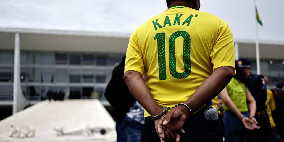 Security forces detain supporters of Brazil's former President Jair Bolsonaro during a demonstration against President Luiz Inacio Lula da Silva, outside Planalto Palace in Brasilia, Brazil, January 8, 2023.