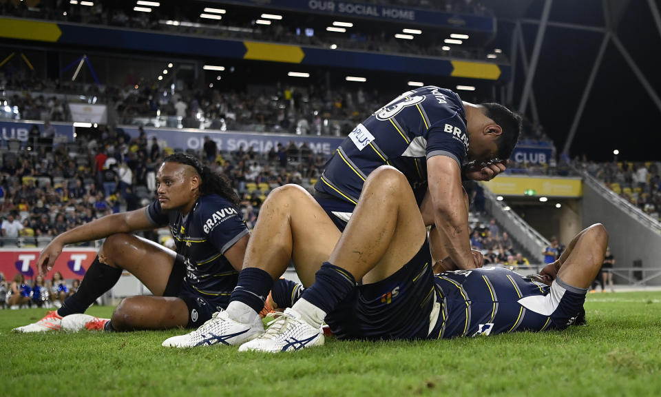 Cowboys players, pictured here after their loss to Parramatta in the NRL preliminary final.