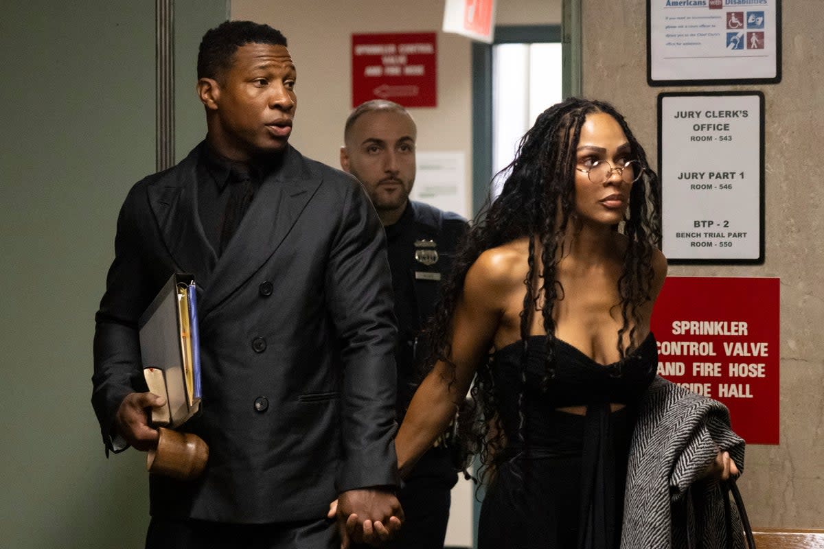 Majors and his current girlfriend Meagan Good arrive at court during his trial (AP Photo/Yuki Iwamura)