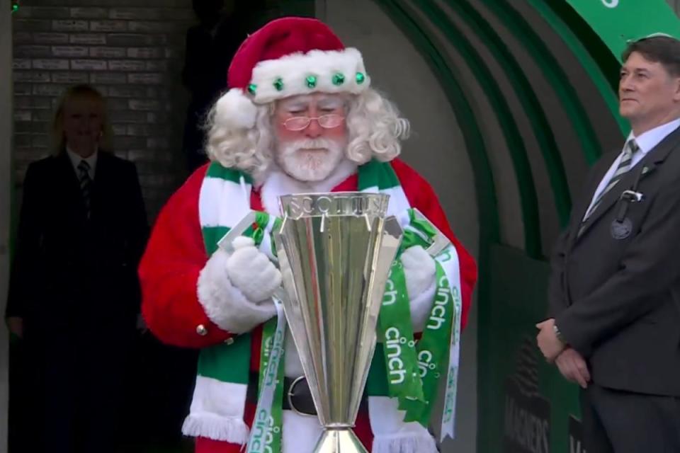 Santa appears with the League Trophy <i>(Image: Sky Sports)</i>