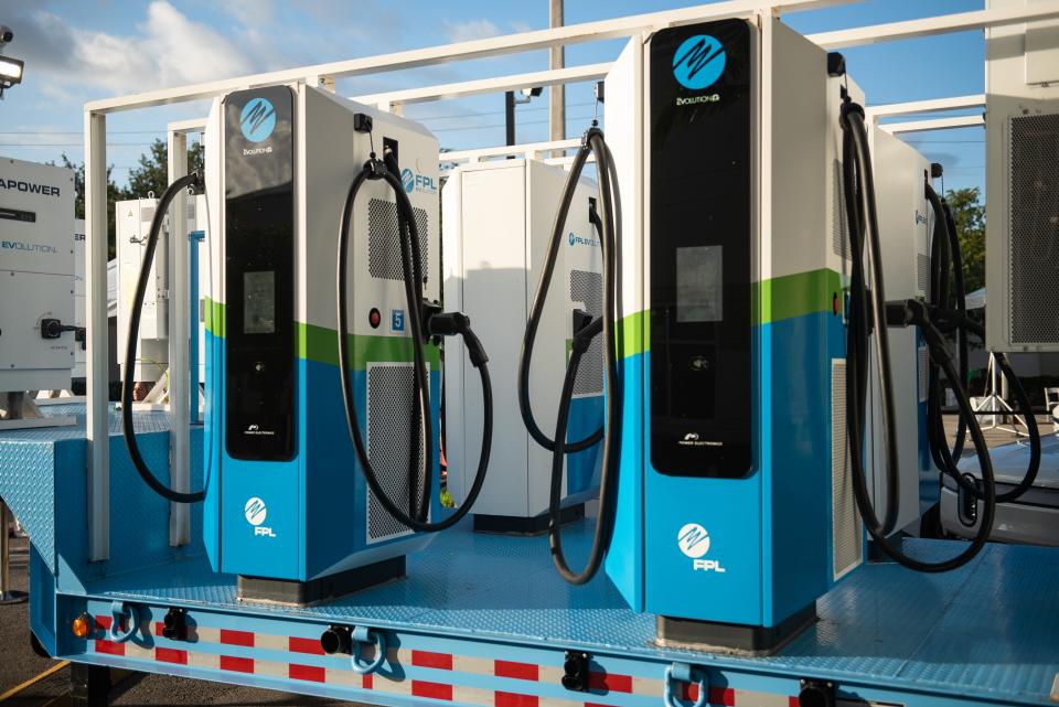 Florida Power & Light's new mobile electric vehicle charging station, which can charge up to six electric vehicles during a power outage, is shown parked at the utility's Riviera Beach location in April.