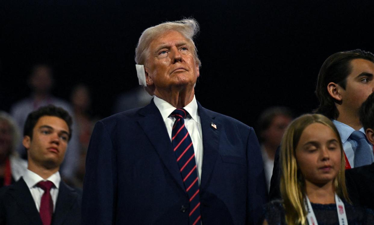 <span>Donald Trump stands with Chloe Trump at the Republican convention, in Milwaukee, Wisconsin, on 17 July 2024.</span><span>Photograph: Callaghan O’Hare/Reuters</span>