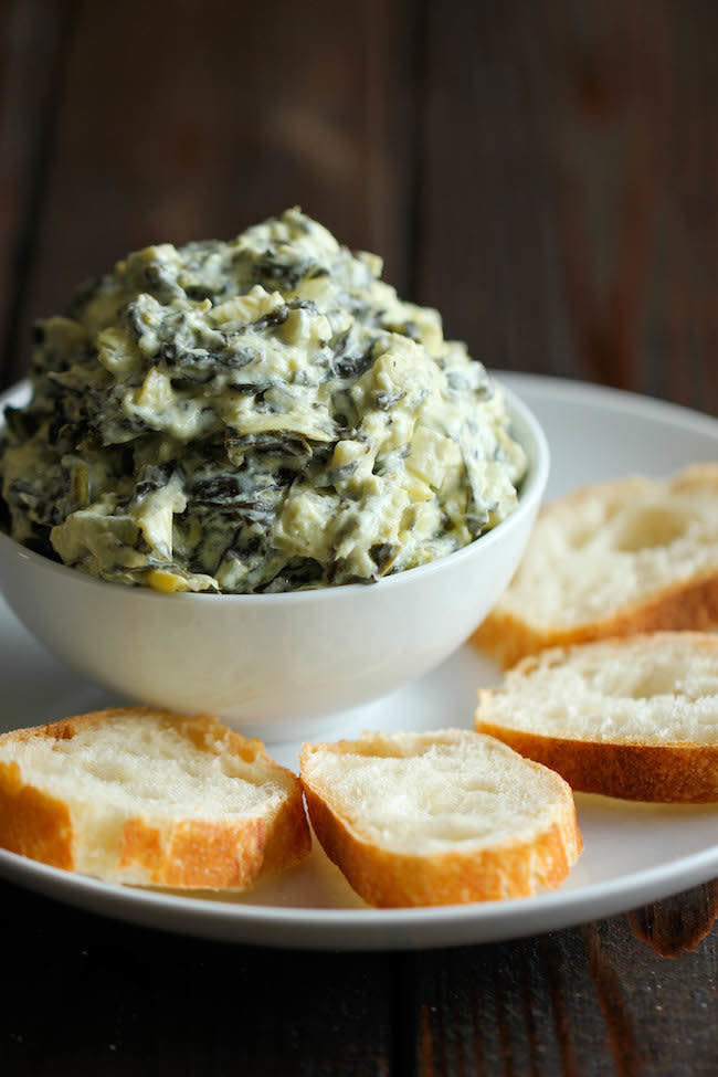 <strong>Get the <a href="http://damndelicious.net/2014/02/12/slow-cooker-spinach-artichoke-dip/" target="_blank">Slow Cooker Spinach Artichoke Dip recipe</a>&nbsp;from Damn Delicious</strong>