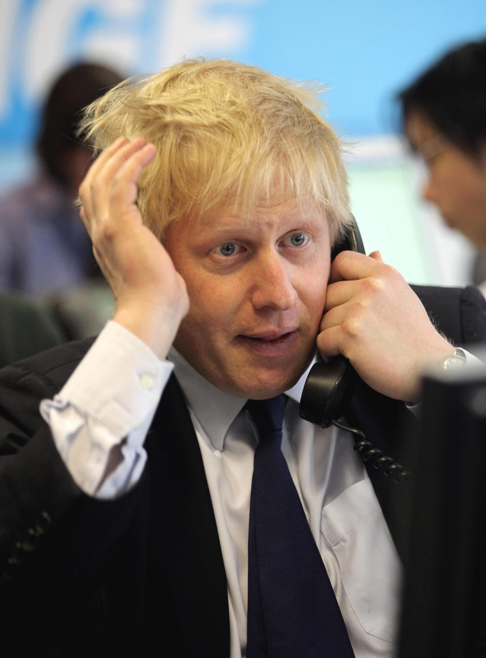 London Mayor Boris Johnson speaks to members of the public at the Conservatives call centre, Millbank, London.