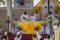 Pope Francis, center, leads a Holy Mass at the John Garang Mausoleum in Juba, South Sudan Sunday, Feb. 5, 2023. Pope Francis is in South Sudan on the final day of a six-day trip that started in Congo, hoping to bring comfort and encouragement to two countries that have been riven by poverty, conflicts and what he calls a "colonialist mentality" that has exploited Africa for centuries. (AP Photo/Ben Curtis)