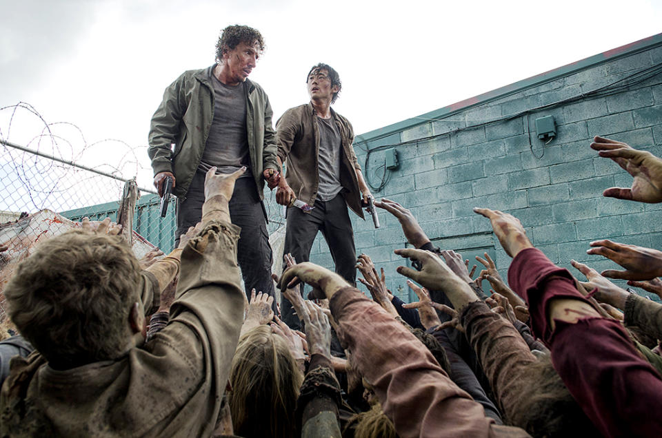 Michael Traynor as Nicholas and Steven Yeun as Glenn Rhee in AMC's The Walking Dead.