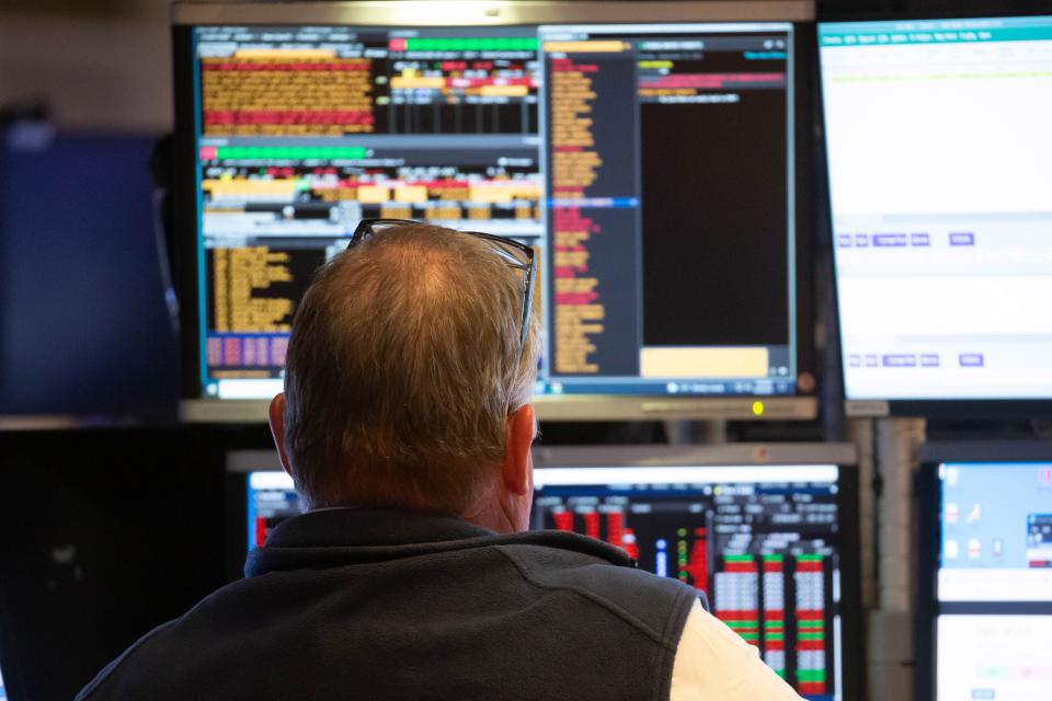 A trader works at the trading floor in the New York Stock Exchange in New York, the United States, Sept. 20, 2021.  U.S. stocks tumbled on Monday as selling pressure intensified on Wall Street.  The Dow Jones Industrial Average fell 614.41 points, or 1.78 percent, to close at 33,970.47, after shedding by more than 970 points at its session low. The S&P 500 dropped 75.26 points, or 1.70 percent, to 4,357.73. The Nasdaq Composite Index slid 330.06 points, or 2.19 percent, to 14,713.90. (Photo by Xinhua via Getty Images)