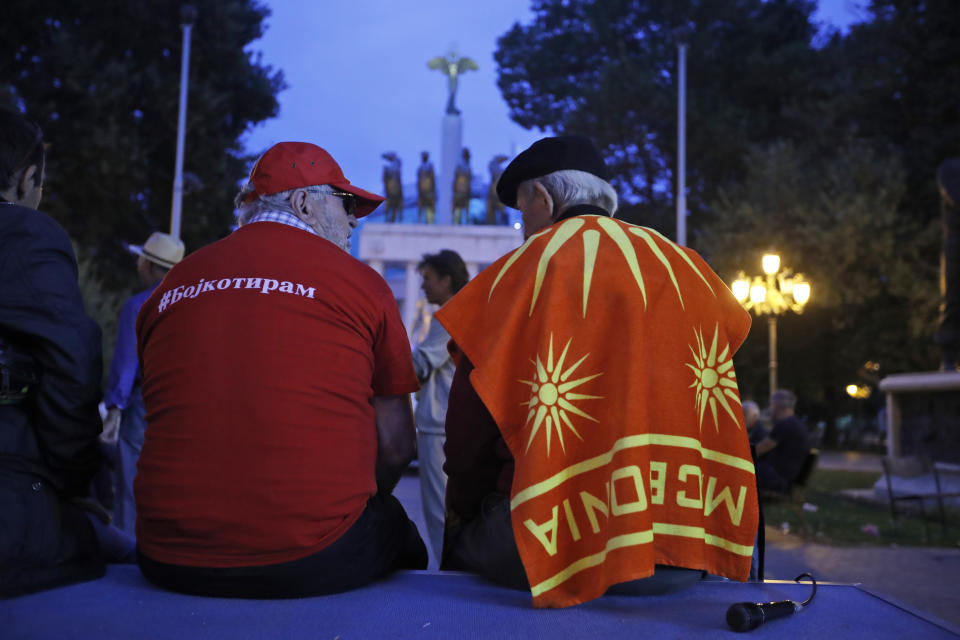 Protesters that had urged voters to boycott Sunday's referendum demonstrate in Skopje, Macedonia, Sunday, Sept. 30, 2018. The t-shirt reads: 'Boycotage'. A crucial referendum on changing the nation of Macedonia's name to North Macedonia to pave the way for NATO membership attracted tepid voter participation Sunday. (AP Photo/Thanassis Stavrakis)