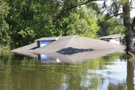 Last month also brought heavy precipitation to parts of the U.S. The only part of this home in Vicksburg Mississippi above water on May 13, 2011 was the roof.