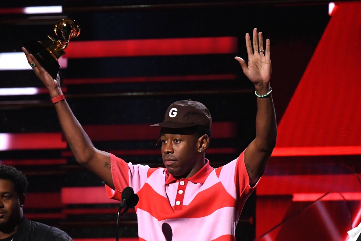 Tyler, the Creator with his Grammy for Best Rap Album: AFP via Getty Images