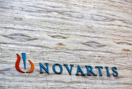 A Novartis logo is pictured on its headquarters building in Mumbai April 1, 2013. REUTERS/Vivek Prakash/File Photo