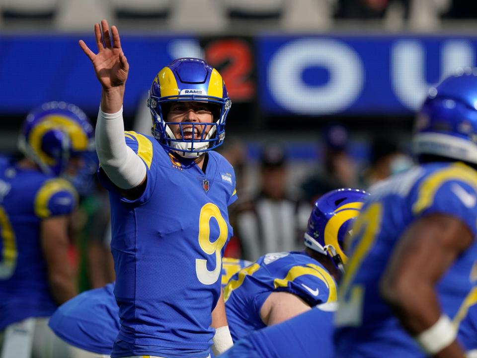 Matthew Stafford signals before a play against the San Francisco 49ers.