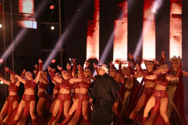 A dance extravaganza by Lebanese troupe Mayyas, who won "America's Got Talent" in 2022, draws thousands to the Beirut waterfront hours after Hezbollah's top commander Fuad Shukr is laid to rest after his death in an Israeli air strike (ANWAR AMRO)