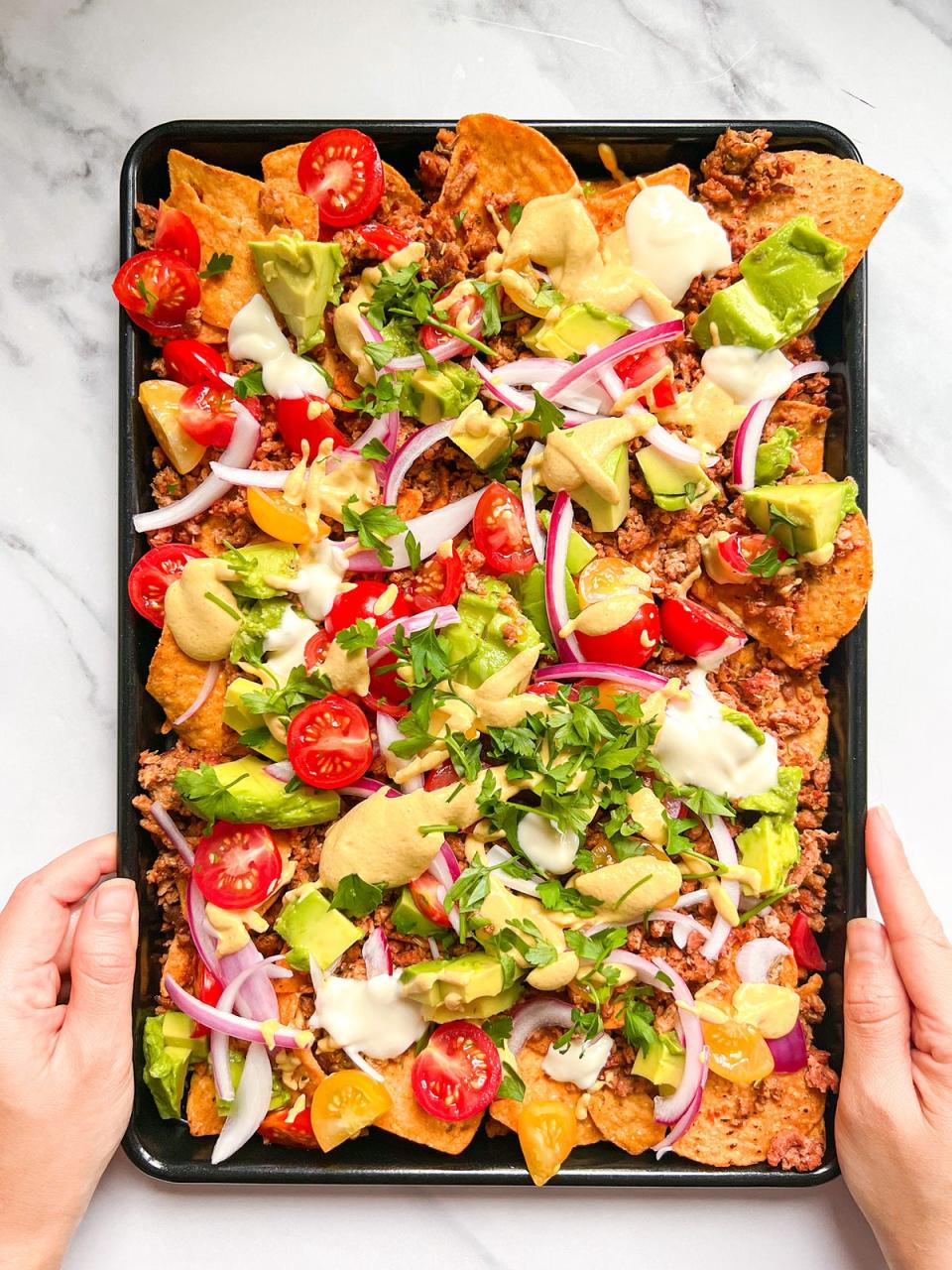 Saturdays are for indulgence, and these plant-based loaded nachos are just that (Meatless Farm)