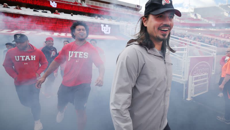 Utah Utes quarterback Cam Rising attends a Crimson Collective truck giveaway to scholarship players at Rice-Eccles Stadium in Salt Lake City on Wednesday, Oct. 4, 2023. After missing the entire 2023, Rising will return to the Utah lineup in 2024.