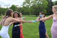 Boston area teens dress up for their prom photos, without the prom to go to amid the coronavirus disease (COVID-19) outbreak in Massachusetts