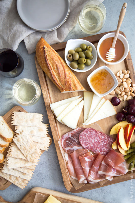 <p>The Little Epicurean</p><p>Whatever the celebration, meat and cheese boards are welcome additions to the table all year long. Paired with a wine or two, meat and cheese boards are the perfect way to celebrate Thanksgiving.</p><p><strong>Get the recipe: <a href="https://www.thelittleepicurean.com/2016/08/meat-and-cheese-board-pairing.html" rel="nofollow noopener" target="_blank" data-ylk="slk:Meat and Cheese Board with Wine Pairings;elm:context_link;itc:0;sec:content-canvas" class="link ">Meat and Cheese Board with Wine Pairings</a></strong></p>