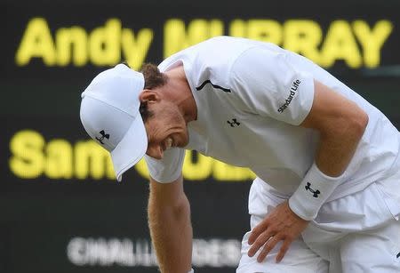 Tennis - Wimbledon - London, Britain - July 12, 2017 Great Britain’s Andy Murray reacts during his quarter final match against Sam Querrey of the U.S. REUTERS/Toby Melville