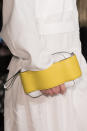 <p><i>White and yellow clutch handbag from the SS18 Joseph collection. (Photo: ImaxTree) </i></p>