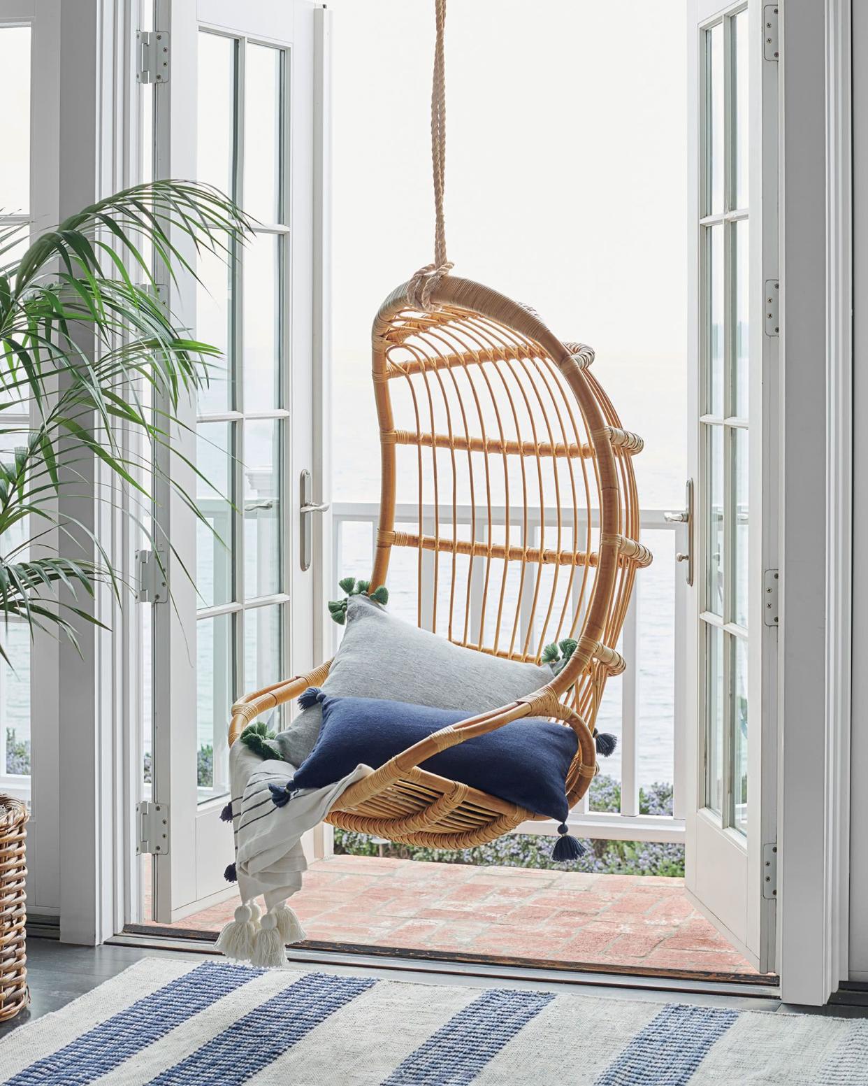 <p><a href="https://go.redirectingat.com?id=74968X1596630&url=https%3A%2F%2Fwww.serenaandlily.com%2Fhanging-rattan-chair%2Fm10499.html&sref=https%3A%2F%2Fwww.elledecor.com%2Fshopping%2Ffurniture%2Fg28497020%2Fbest-hanging-chairs%2F" rel="nofollow noopener" target="_blank" data-ylk="slk:Shop Now;elm:context_link;itc:0;sec:content-canvas" class="link rapid-noclick-resp">Shop Now</a></p><p>Hanging Rattan Chair</p><p>Serena & Lily</p><p>$298.00</p><span class="copyright">Serena & Lily</span>