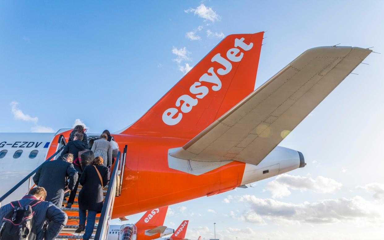 EasyJet will soon charge passengers for all bags that don't fit underneath the seat in front - iStock