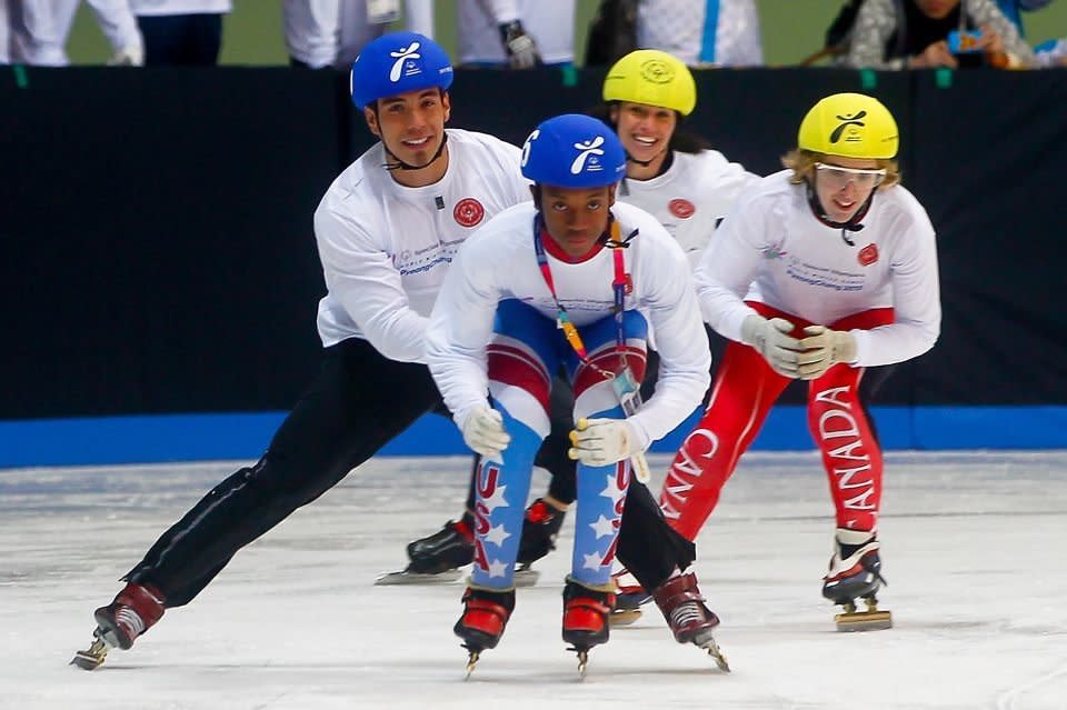 Olympic greats Apolo Anton Ohno and Catriona Le May Doan push tag their teammates -- O'Conner Anderson and Katie Saunders -- in a speed skating event. 