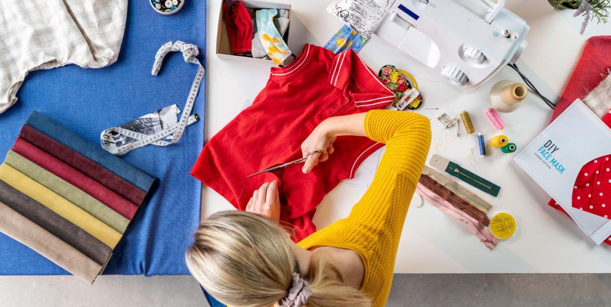 woman sewing on a sewing machine