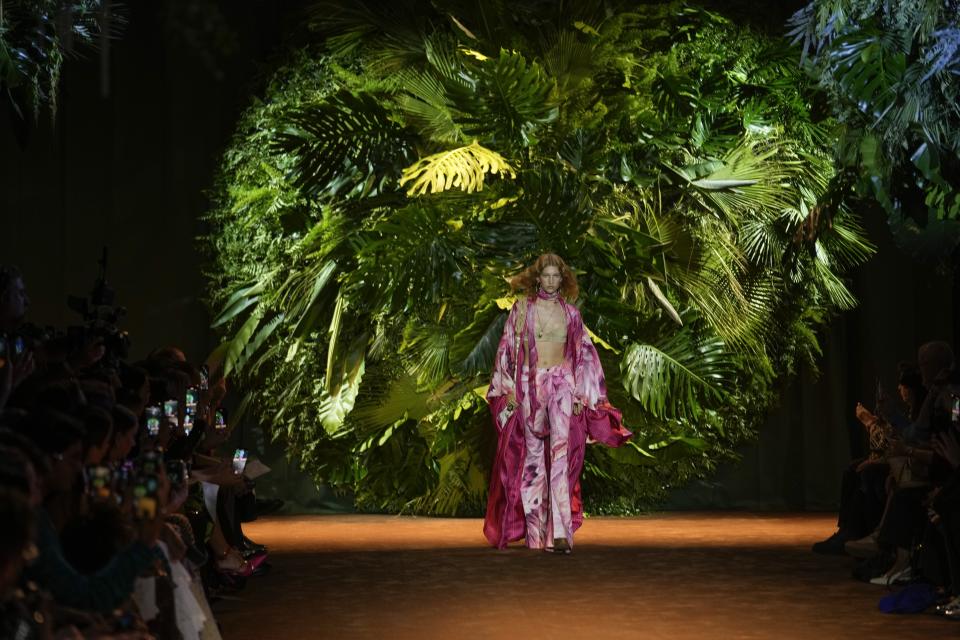 A model wears a creation as part of the Roberto Cavalli women's Spring Summer 2024 collection presented in Milan, Italy, Wednesday, Sept. 20, 2023. (AP Photo/Luca Bruno)