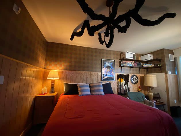 One of the rooms features a Demogorgon above the bed and a poster of John Carpenter's 