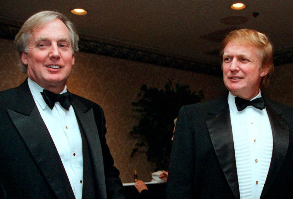 Robert Trump (left) is pictured joining then real estate developer and presidential hopeful Donald Trump (right) at an event in New York. Robert Trump died on Saturday after being hospitalized in New York, the president said in a statement. He was 71.