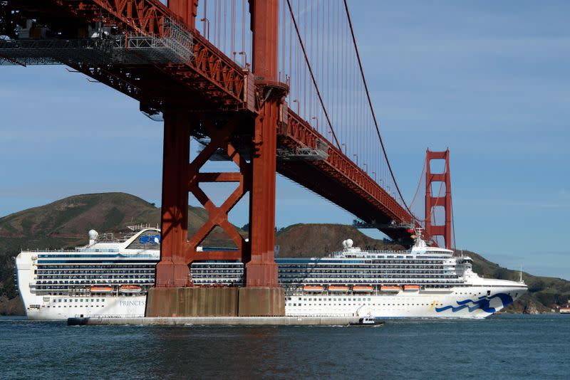 The Grand Princess cruise ship carrying passengers who have tested positive for coronavirus passes the Golden Gate bridge in San Francisco