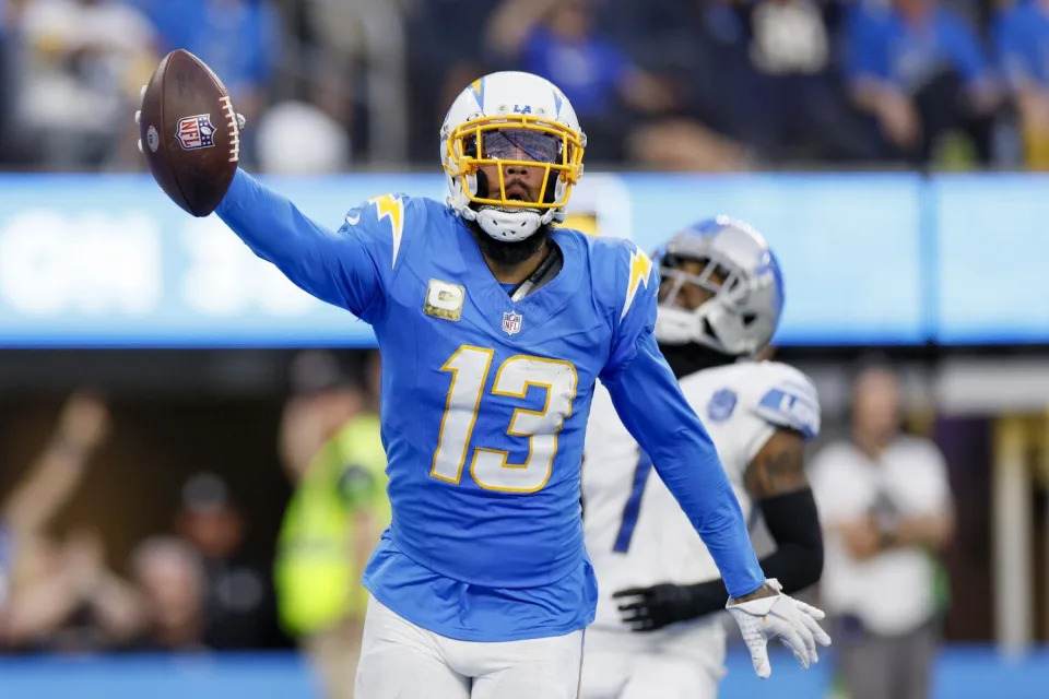 Chargers receiver Keenan Allen (13) celebrates after scoring a touchdown against the Detroit Loins.