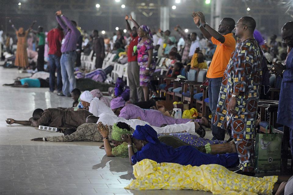 <span class="caption">Pentacostalism is the fast growing movement in Africa. This image shows worshippers in Nigeria.</span> <span class="attribution"><a class="link " href="https://www.gettyimages.com/detail/news-photo/worshippers-pray-into-the-new-year-lying-down-during-the-news-photo/459883839?adppopup=true" rel="nofollow noopener" target="_blank" data-ylk="slk:PIUS UTOMI EKPEI/AFP via Getty Images;elm:context_link;itc:0;sec:content-canvas">PIUS UTOMI EKPEI/AFP via Getty Images</a></span>