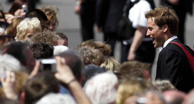 Prince William meets the crowds as he leaves the St Salvator’s Quadrangle. William got a 2:1 in geography (David Cheskin/PA)