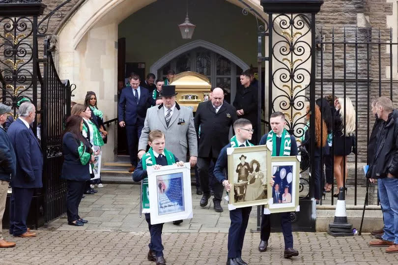 Jim Coffey's coffin is carried out of St Alban on the Moors Church in Splott, Cardiff