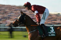 Horse Racing - Grand National Festival - Aintree Racecourse, Liverpool, Britain - April 6, 2019 Tiger Roll ridden by Davy Russell during the 5.15 Randox Health Grand National Handicap Chase REUTERS/Peter Powell