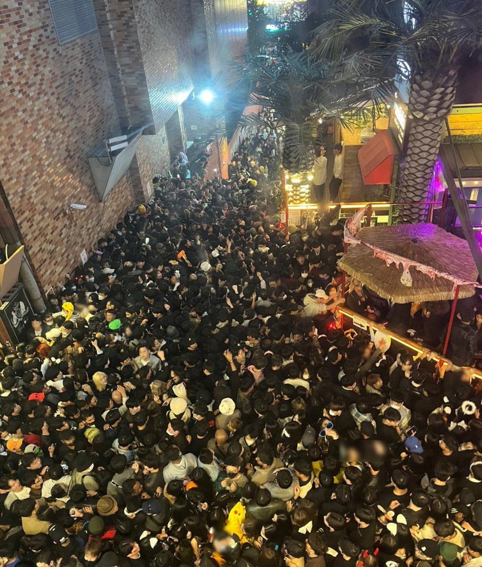 A street in Itaewon district is pictured full of people before a stampede during Halloween festivities killed and injured many in Seoul, South Korea
