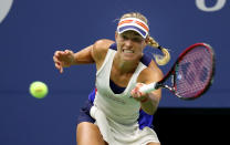 <p>Angelique Kerber of Germany returns a shot to Naomi Osaka of Japan on Day Two of the 2017 US Open at the USTA Billie Jean King National Tennis Center on August 29, 2017 in the Flushing neighborhood of the Queens borough of New York City. (Photo by Abbie Parr/Getty Images) </p>