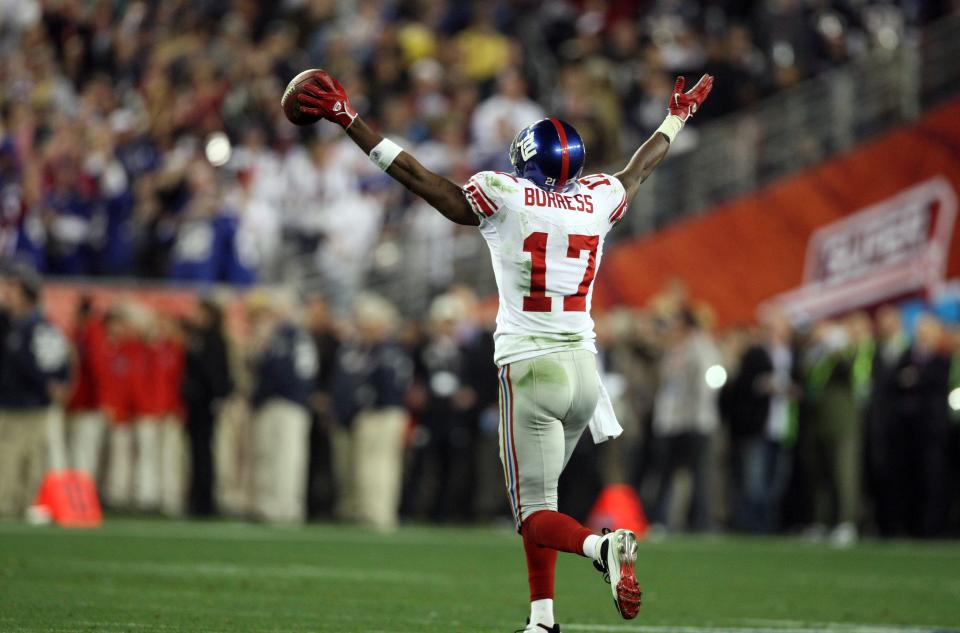 Feb 3, 2008; Glendale, AZ, USA; New York Giants receiver Plaxico Burress (17) celebrates a game winning touchdown in the fourth quarter of Super Bowl XLII at the University of Phoenix Stadium. New York Giants defeated the New England Patriots with a final of 17-14.  Mandatory Credit: Matthew Emmons-USA TODAY Sports