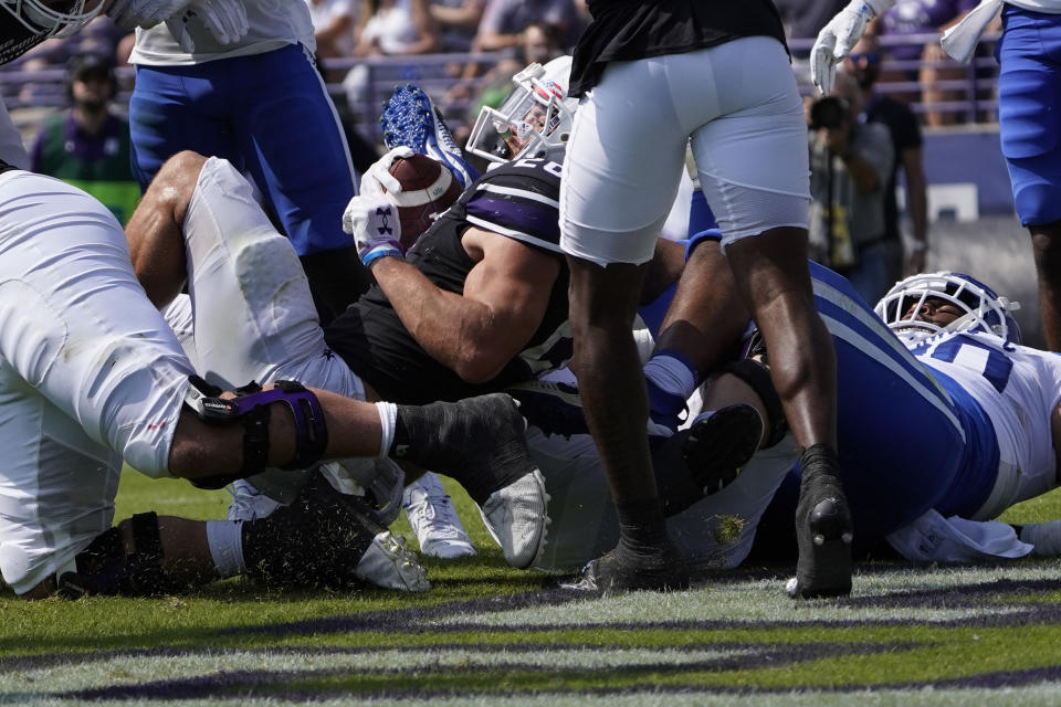 Northwestern running back Evan Hull, center, scores a touchdown against Duke during the first half of an NCAA college football game, Saturday, Sept.10, 2022, in Evanston, Ill. (AP Photo/David Banks)