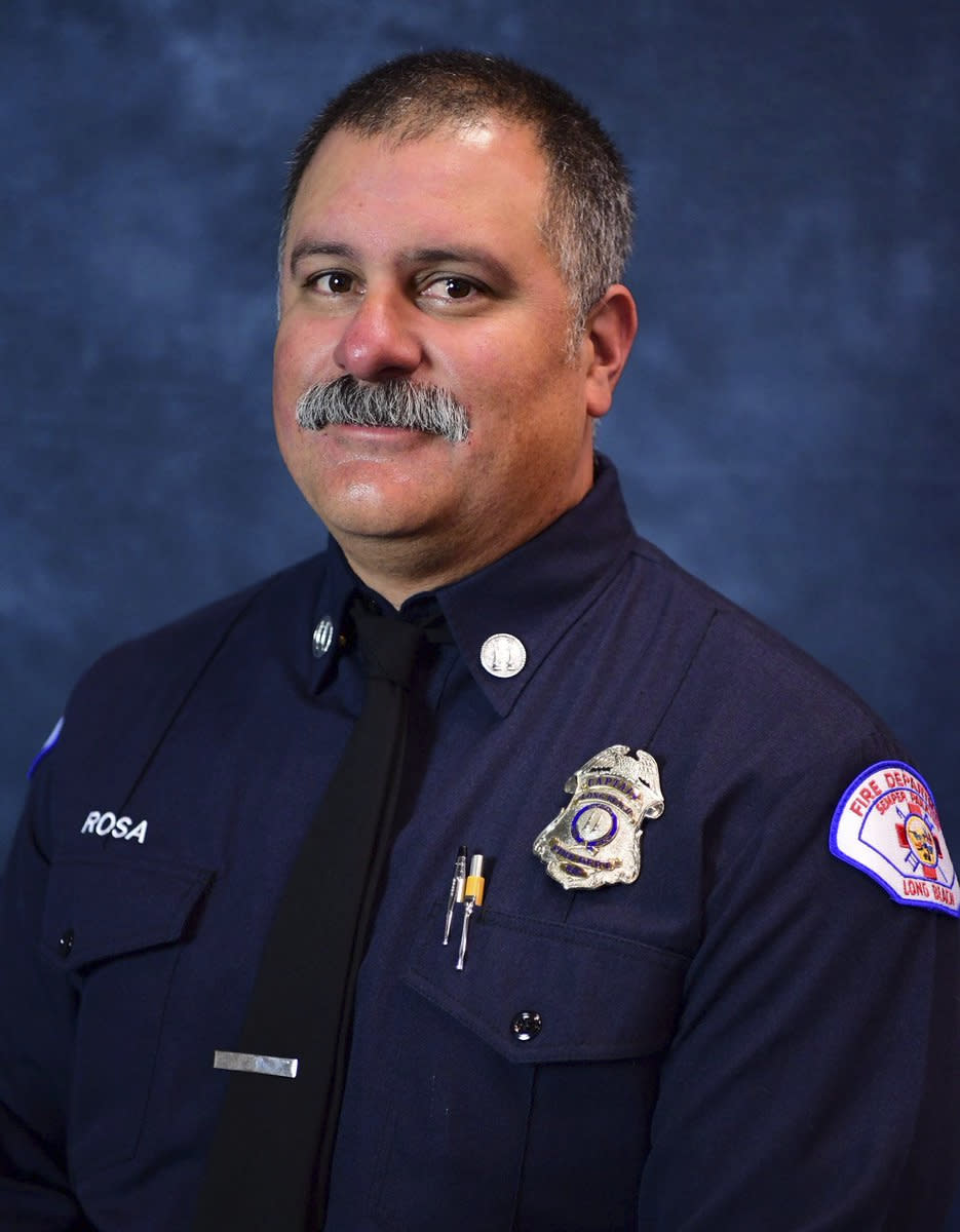 FILE - This undated file photo provided by the Long Beach Fire Department shows Captain David Rosa who was fatally shot while responding to an emergency at a senior home on Monday, June 25, 2018 in Long Beach, Calif. Thomas Kim, 77, charged with shooting to death the fire captain at a Southern California senior housing facility has died Sunday, Aug. 5, 2018, in custody from an existing medical condition, authorities said Monday, Aug. 6. (Long Beach Fire Department via AP, File)