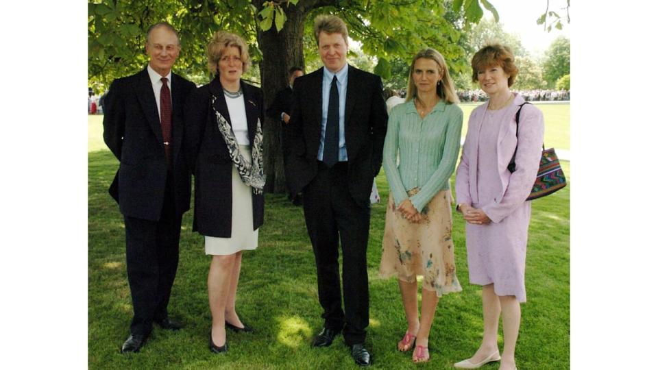 Earl Spencer with Sir William Fellowes, Lady Jane Fellowes, Lady Spencer and Lady Sarah Macorquadale after the unveiling ceremony for the Princess Diana memorial fountain in London's Hyde Park 