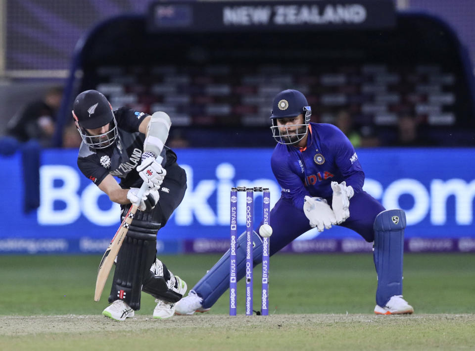 New Zealand's captain Kane Williamson plays a shot during the Cricket Twenty20 World Cup match between New Zealand and India in Dubai, UAE, Sunday, Oct. 31, 2021. (AP Photo/Aijaz Rahi)