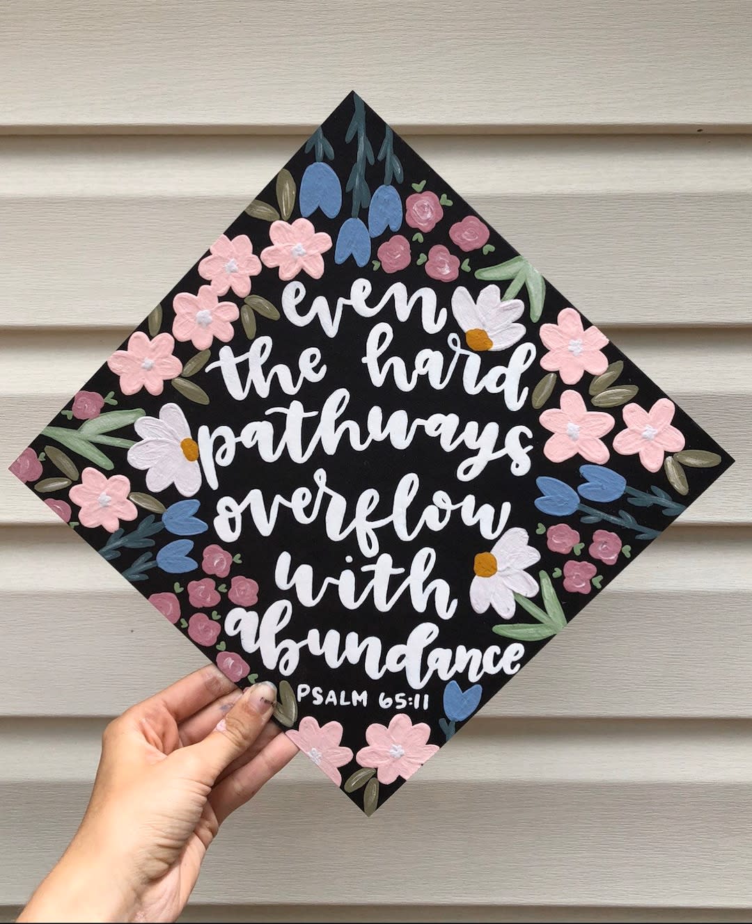 <p><a href="https://go.redirectingat.com?id=74968X1596630&url=https%3A%2F%2Fwww.etsy.com%2Flisting%2F1215502950%2Fpainted-graduation-cap-painted-flowers&sref=https%3A%2F%2Fwww.thepioneerwoman.com%2Fhome-lifestyle%2Fcrafts-diy%2Fg39693817%2Fgraduation-cap-ideas%2F" rel="nofollow noopener" target="_blank" data-ylk="slk:Shop Now;elm:context_link;itc:0;sec:content-canvas" class="link rapid-noclick-resp">Shop Now</a></p><p>Painted Graduation Cap</p><p>etsy.com</p><p>$52.00</p><span class="copyright">AHalOfAGirl</span>